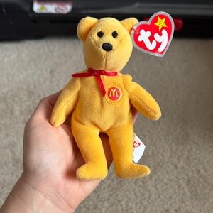 Ty 2004 McDonald’s 25th anniversary Golden Teddy Bear Plush with Red Ribbon